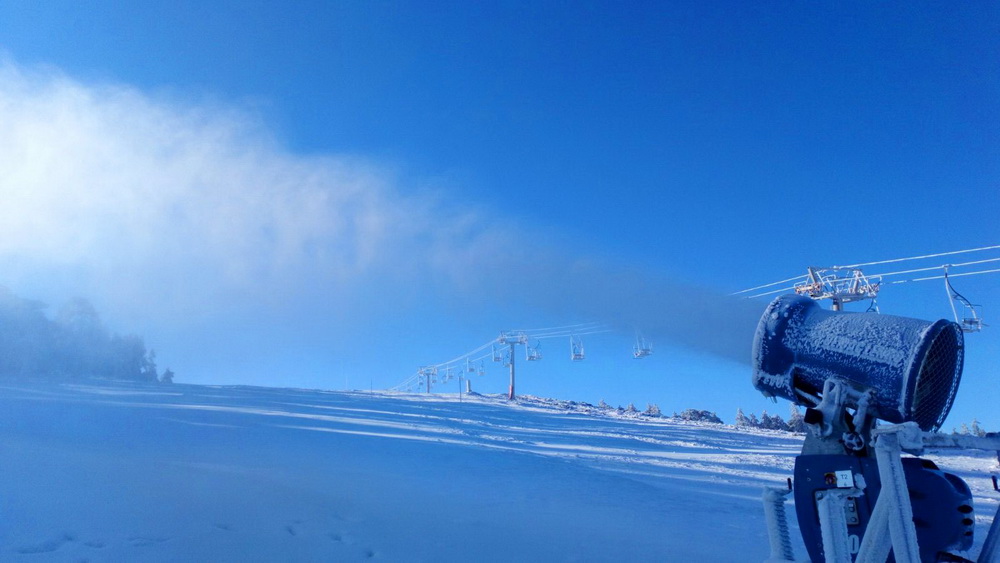 Crni Vrh in Serbia - a person on a snowboard in the snow.