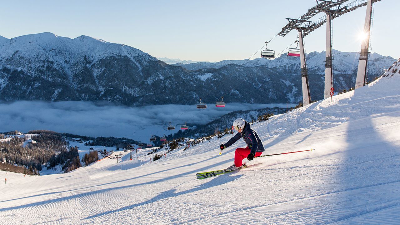 Christlum – Achenkirch in Austria - a person skiing down a snowy slope in the mountains.