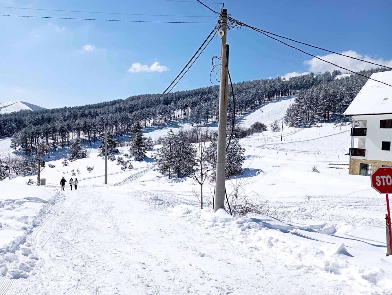 Sneško Goč in Serbia - a snow covered ski slope with a stop sign.
