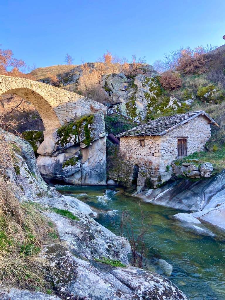 Kopanki in North Macedonia - an old stone bridge over a river in the mountains.