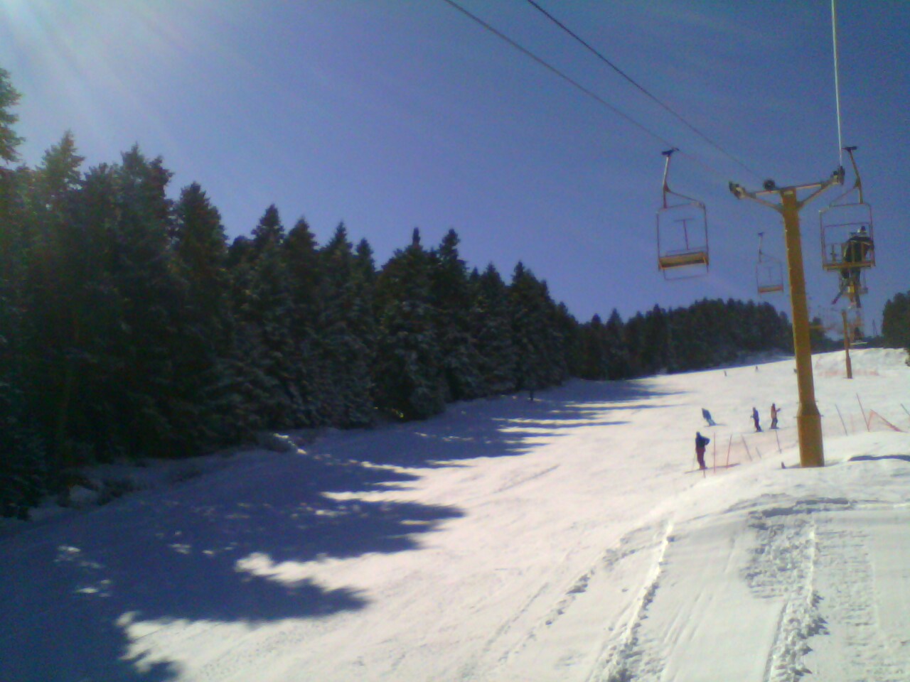 Kopanki in North Macedonia - a ski lift going down a snowy slope.