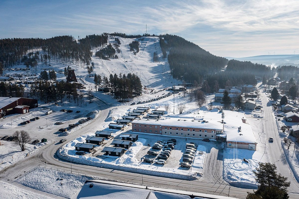 Vittjåkk in Sweden: an aerial view of a ski resort in the mountains.