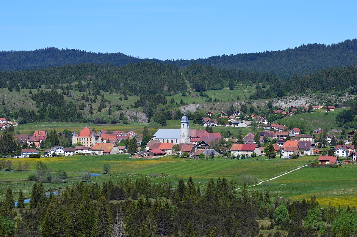 Mouthe – Massif du Noirmont in France - a small town surrounded by trees in the mountains.