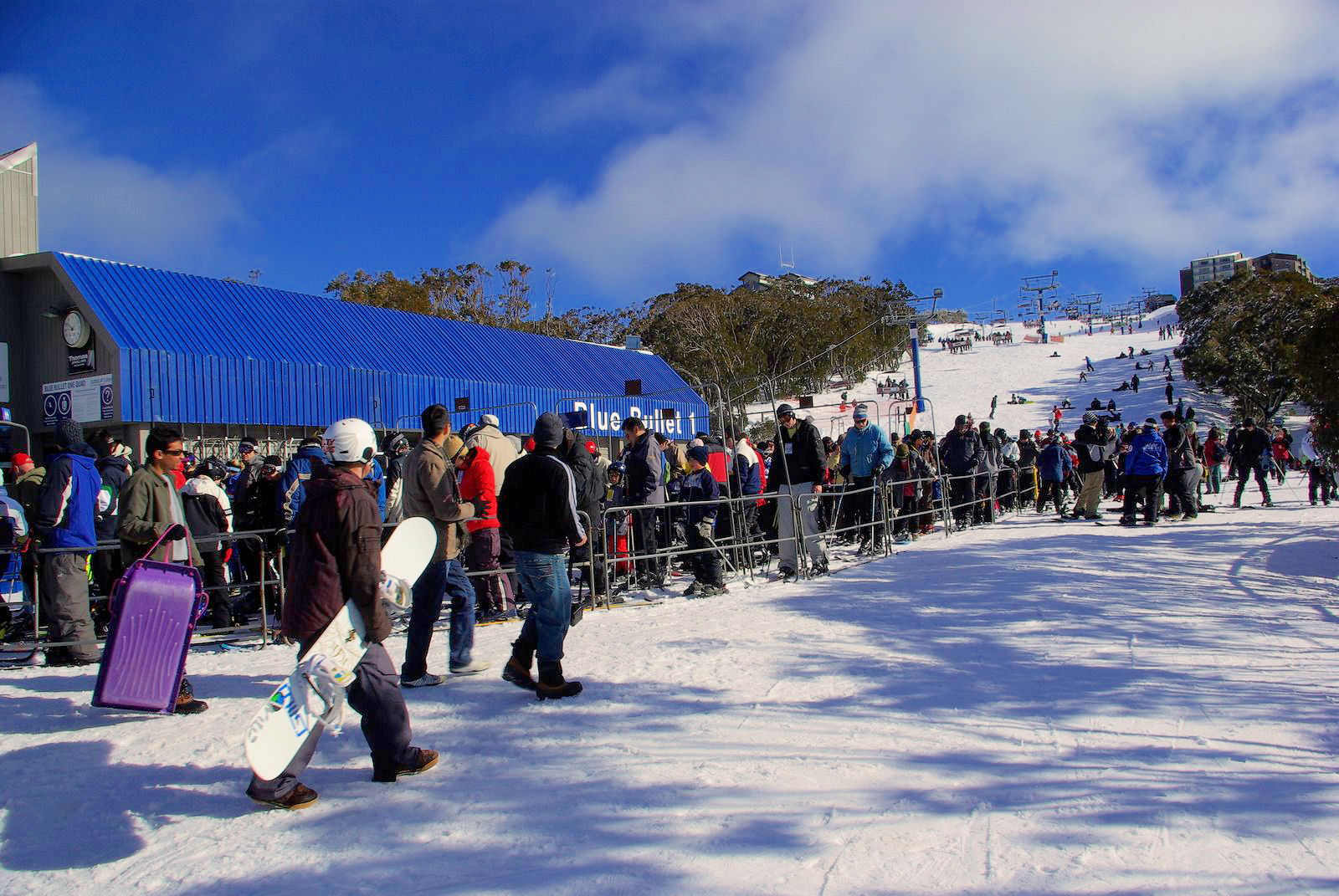 Mt Buller in Australia - a crowd of people standing in the snow.