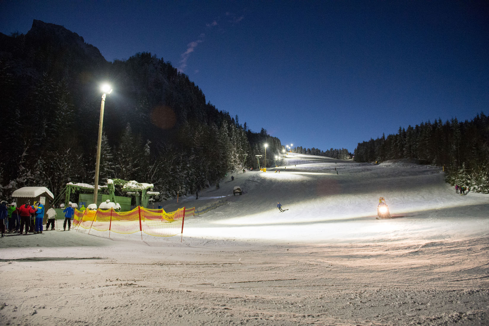 Hochlecken Skilifte in Austria - a group of people standing on a snow covered slope.