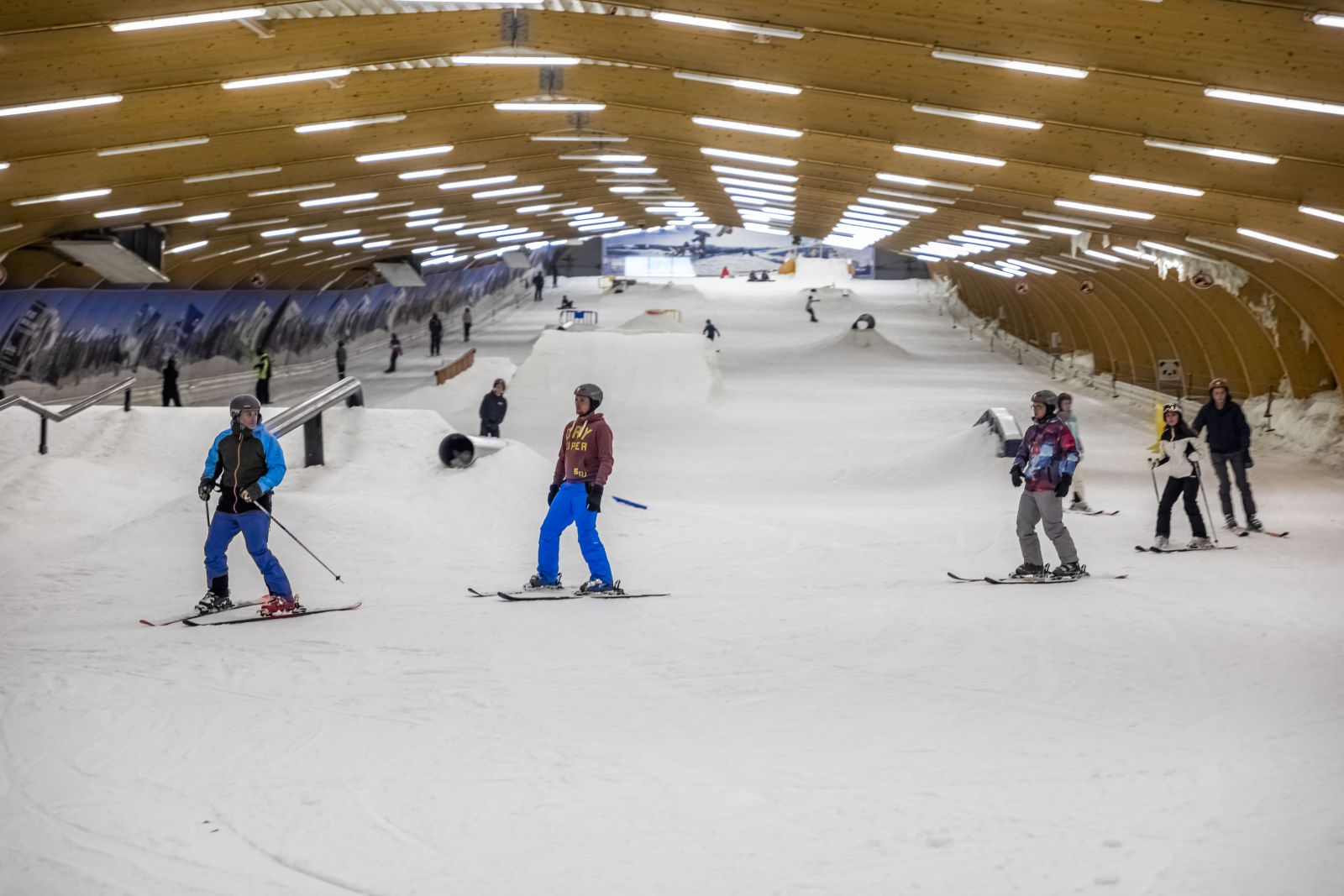 Ice Mountain in Belgium - a group of people skiing down a snow covered slope.