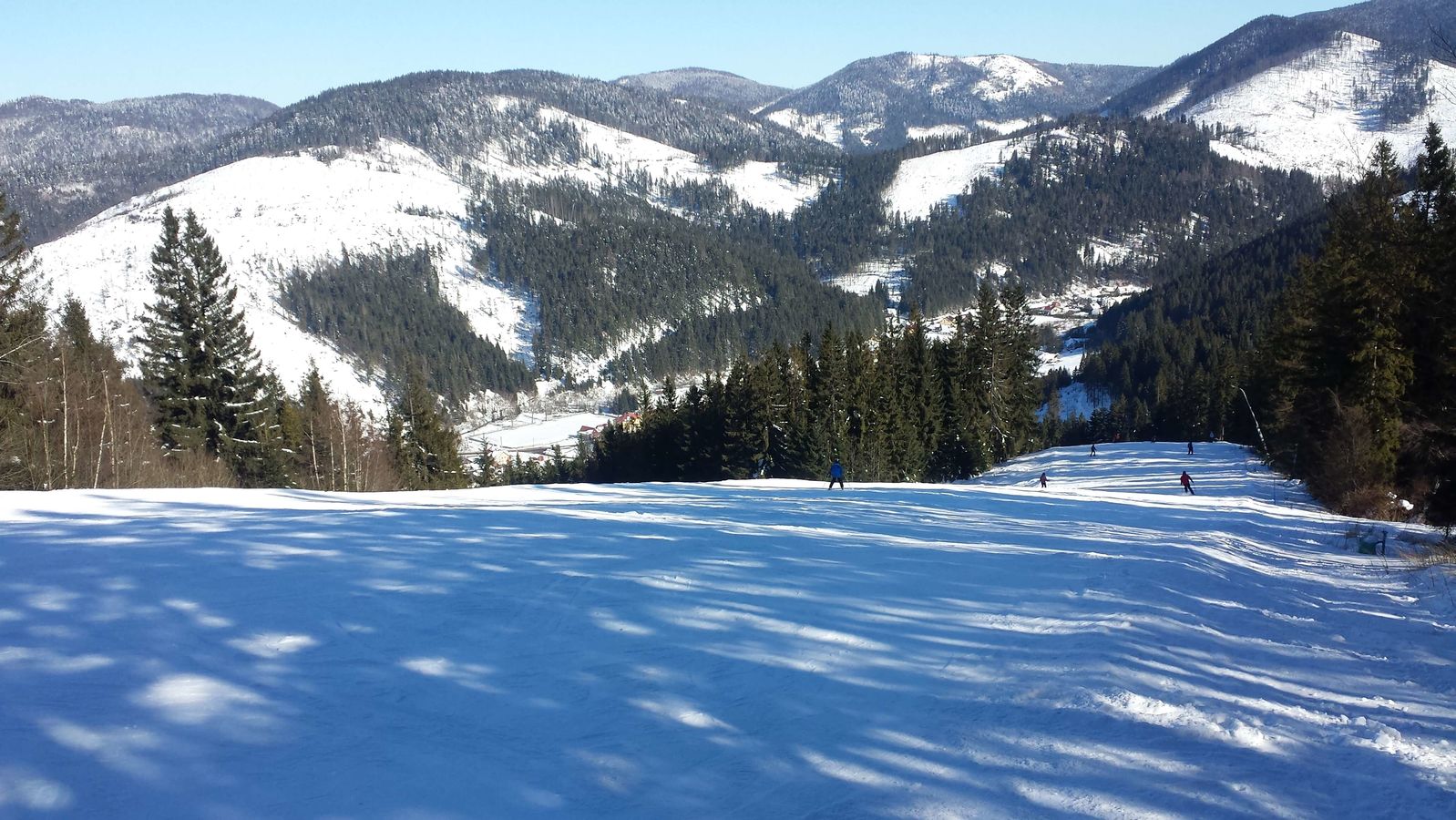 Gugel – Mlynky in Slovakia - a snow covered ski slope with mountains in the background.