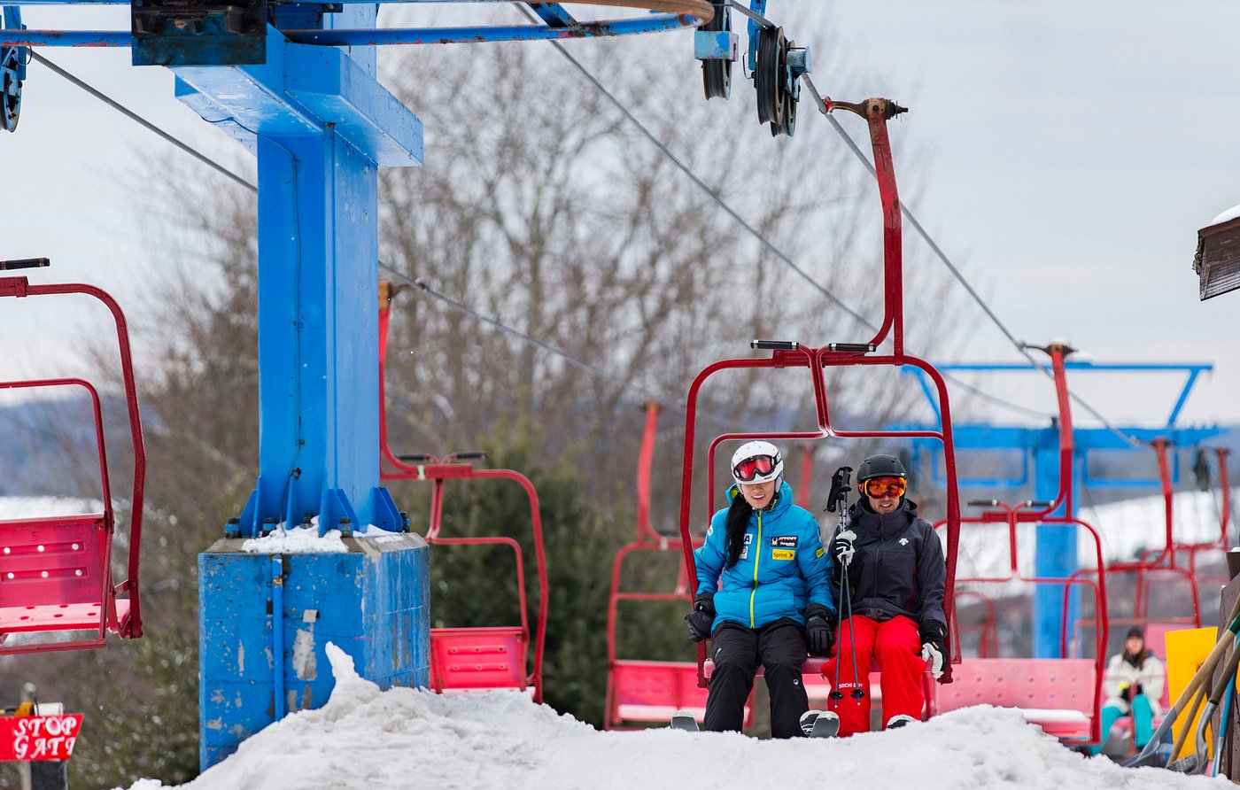 A ski lift ascends at Villa Roma in The Catskills New York as skiers prepare to enjoy a day of winter sports in the snow-covered resort.