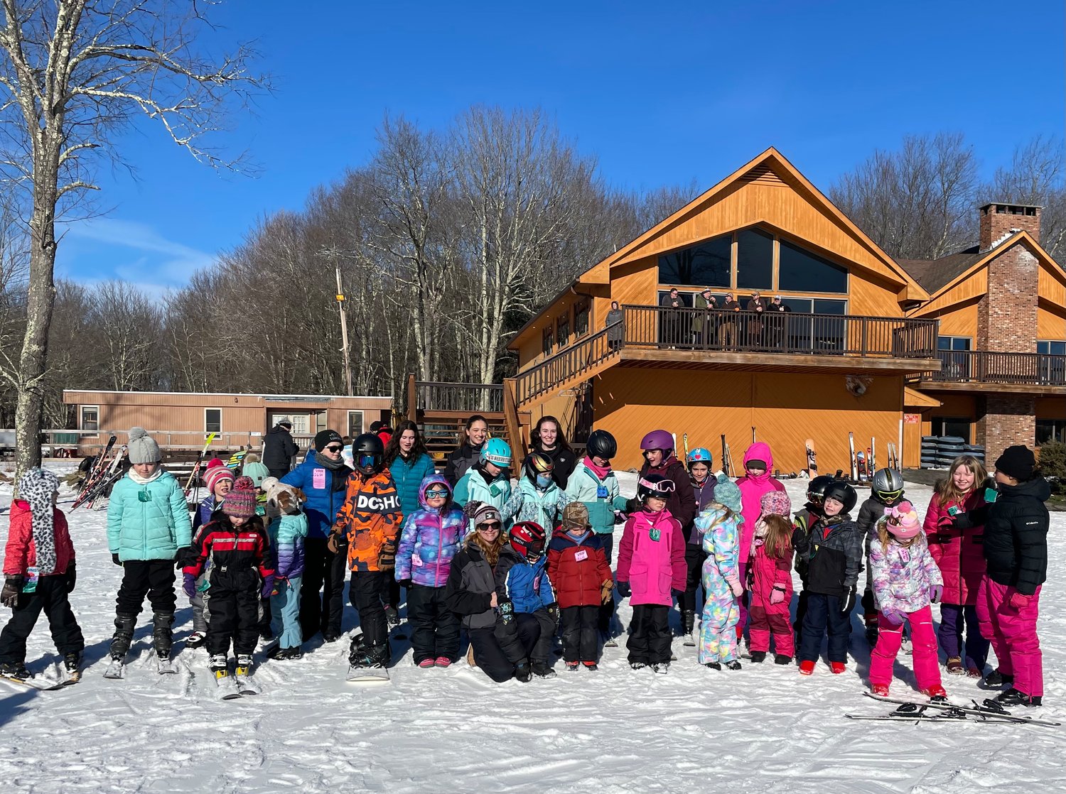Villa Roma in USA - a group of kids posing for a picture in the snow.