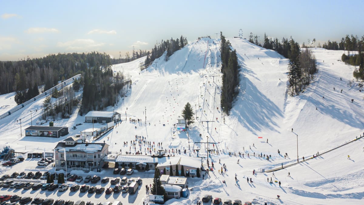 Vihti Ski Center in Finland - a ski slope with lots of people on it.