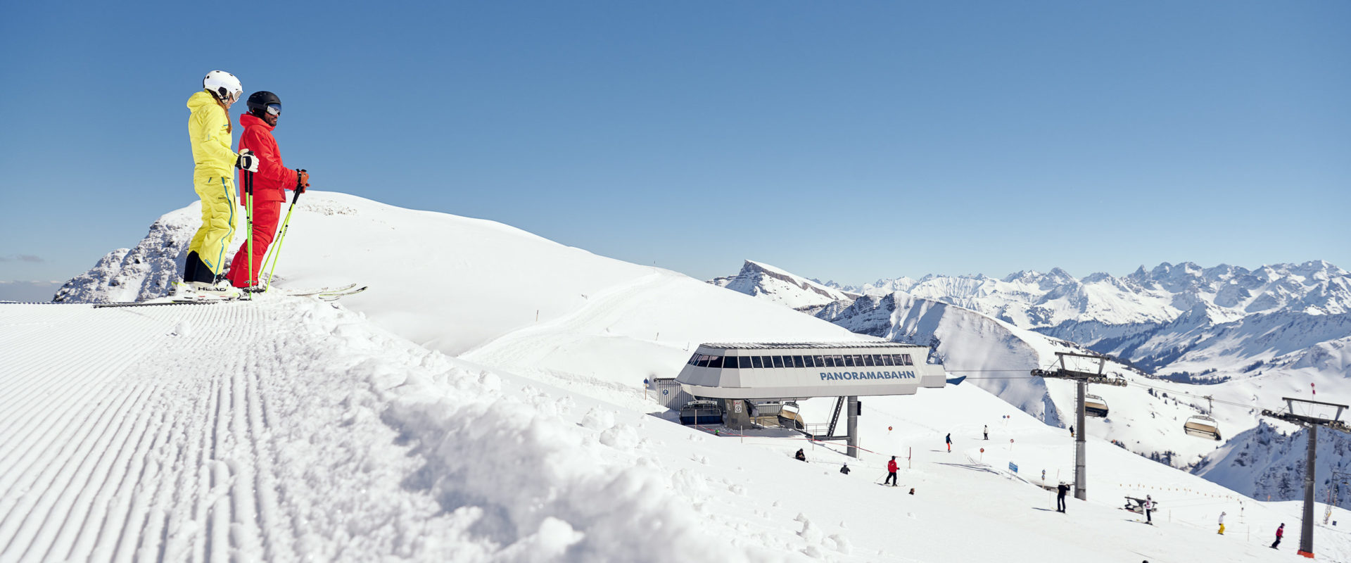 Diedamskopf – Schoppernau in Austria - a person standing on top of a snow covered mountain.