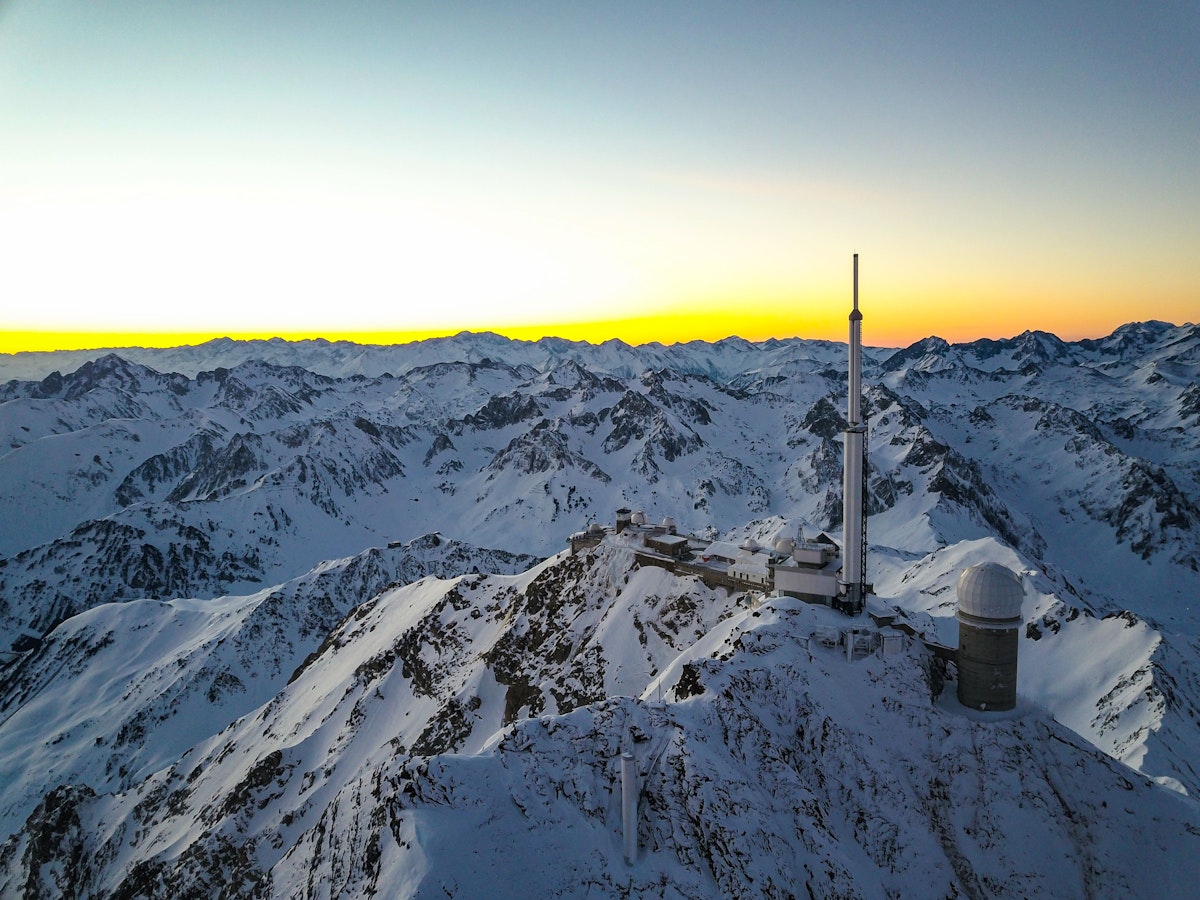 La Mongie | ​Barèges, Grand Tourmalet | ​Pic du Midi in France - a view from the top of a mountain at sunset.