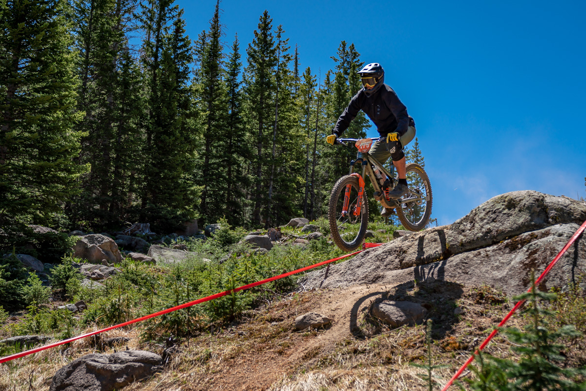 Sunrise Park in USA - a man riding a mountain bike on a rocky trail.