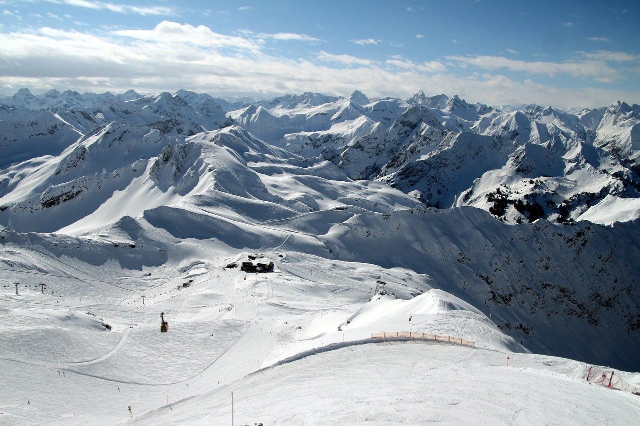 Nebelhorn – Oberstdorf in Germany - a view from the top of a snowy mountain.