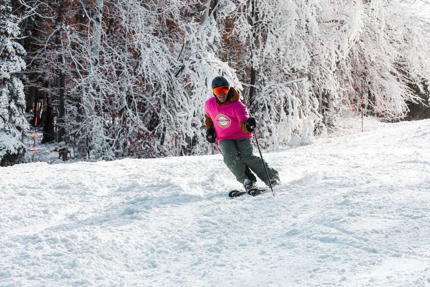 Sommet Saint-Sauveur in Canada - a person on a snowboard in the snow.