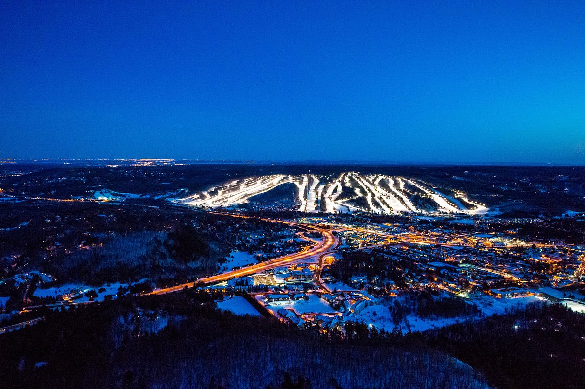 Sommet Saint-Sauveur in Canada - the view from the top of the mountain at night.