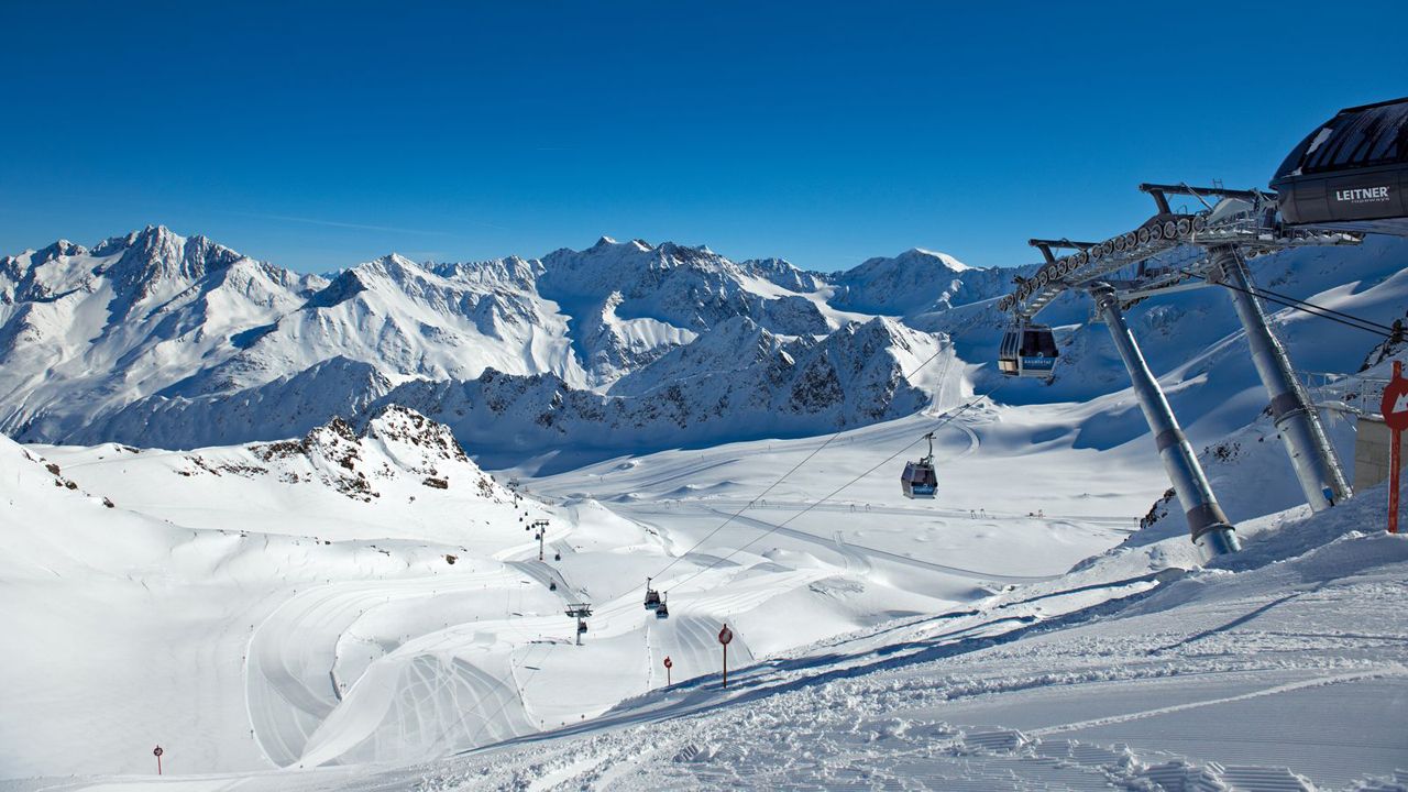 Kaunertaler Glacier in Austria - a ski lift going up a snowy mountain.