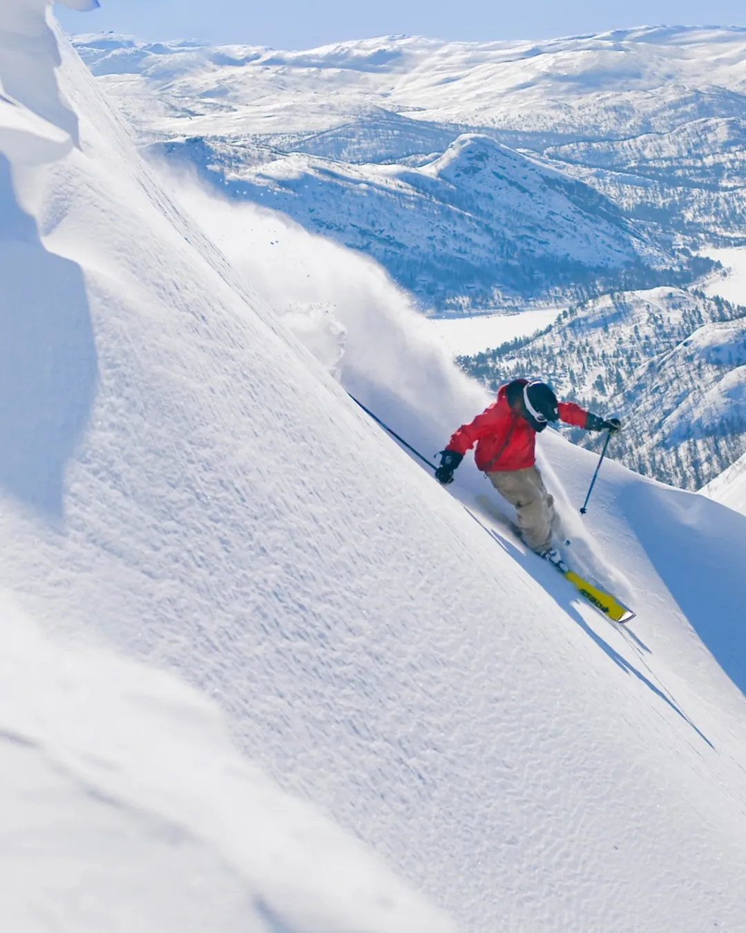 Hovden in Norway - a person skiing down the side of a mountain.