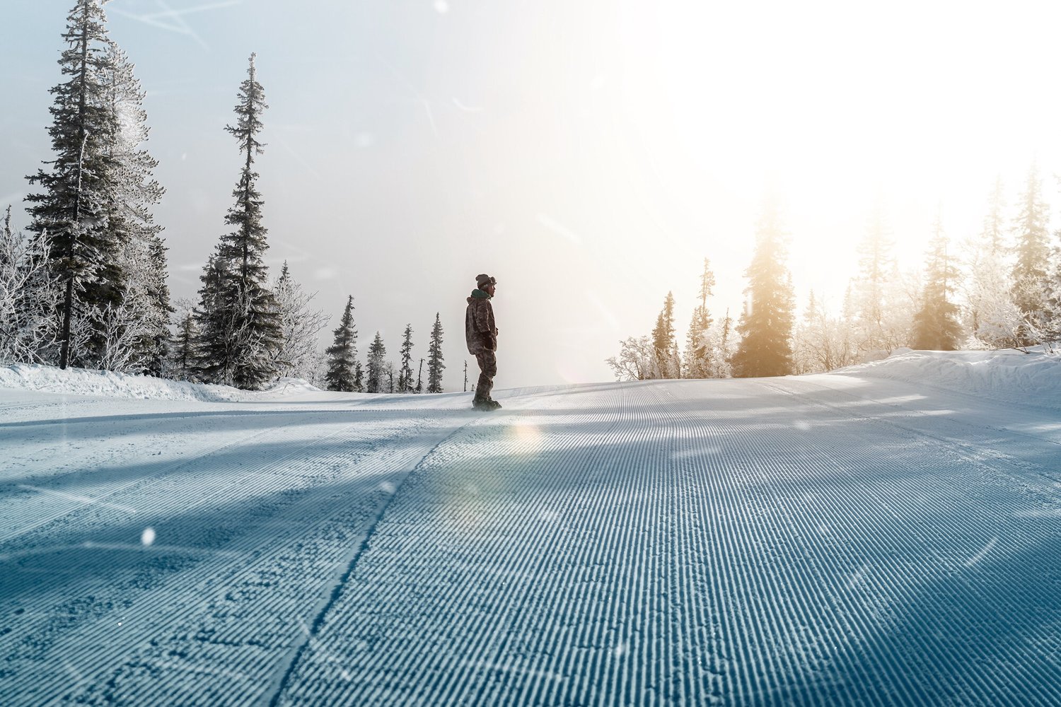 Dundret Lapland – Gällivare in Sweden - a person on a snowboard in the snow.