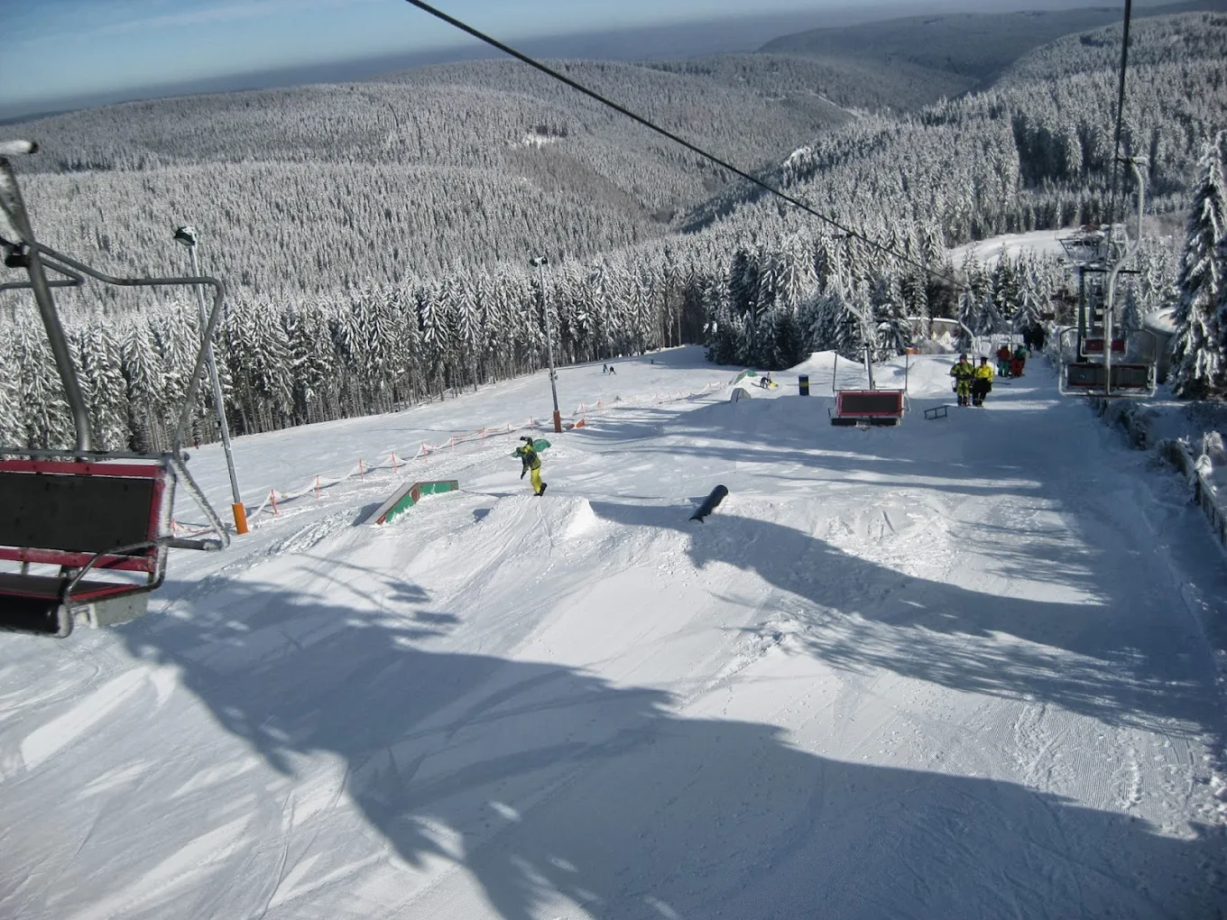 Fallbachhang – Oberhof in Germany - a ski lift going down a snowy slope.