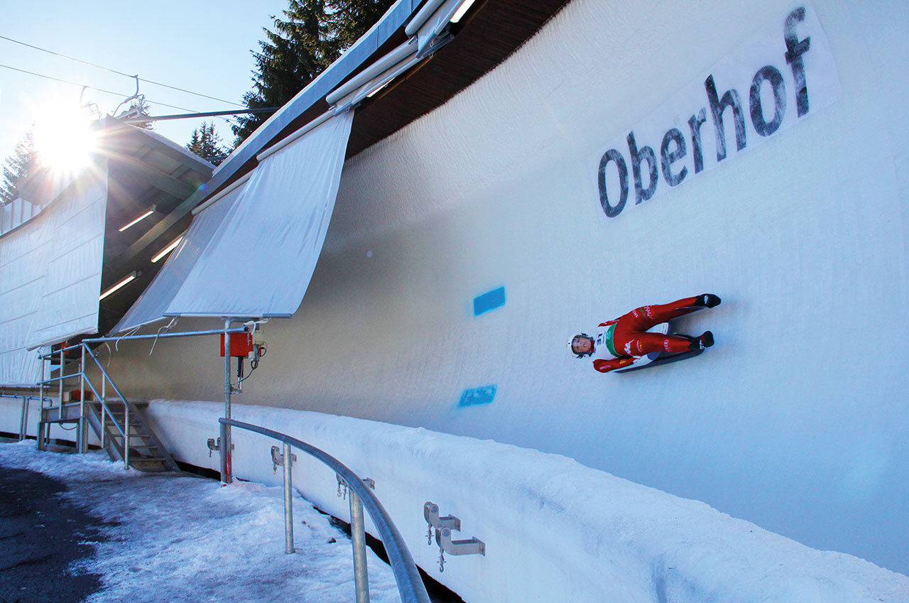 Fallbachhang – Oberhof in Germany - a person on a snowboard in the snow.