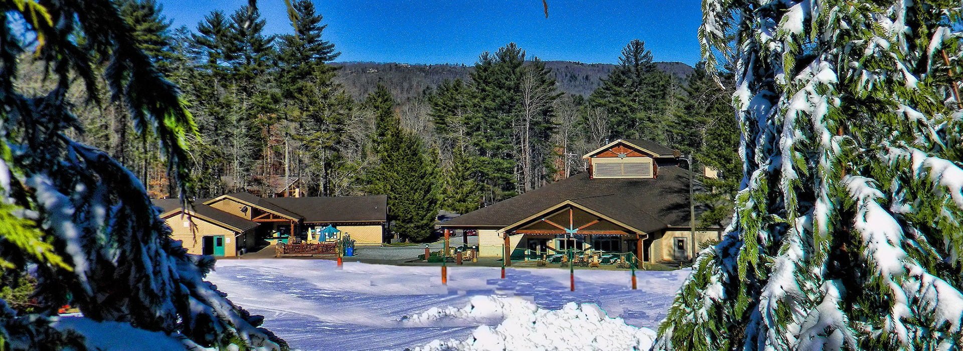 Sapphire Valley in USA - a view of the lodge from the snow covered trail.