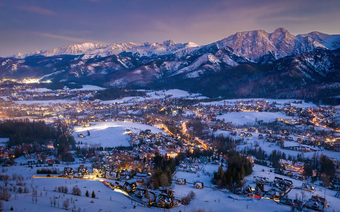 Gubałówka – Zakopane in Poland - a town in the mountains at night.