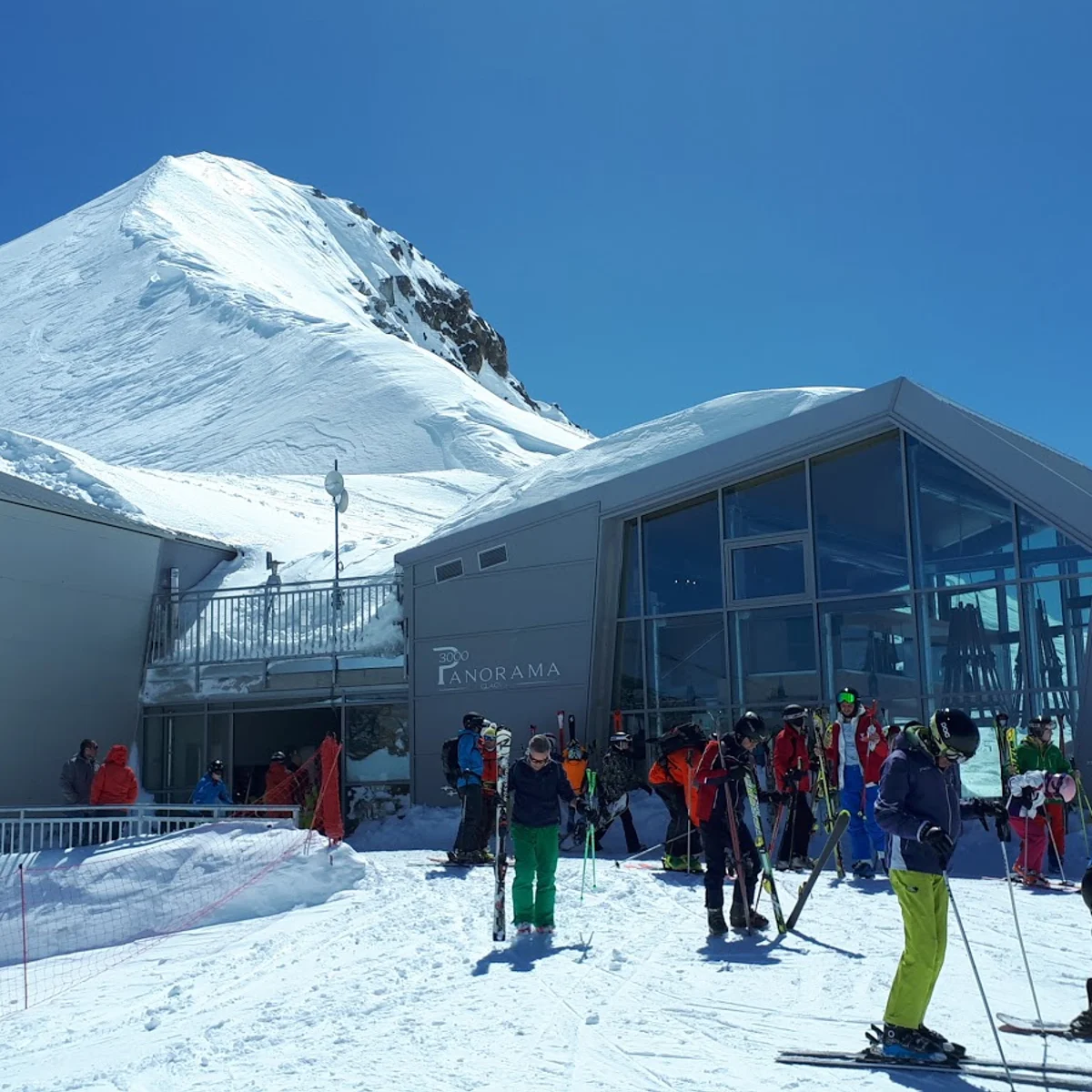 Funivie Folgarida Marilleva in Italy - a group of people that are standing in the snow.