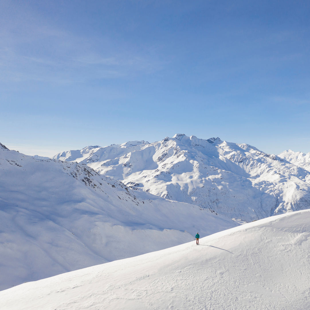 Disentis in Switzerland - snow on the mountain.