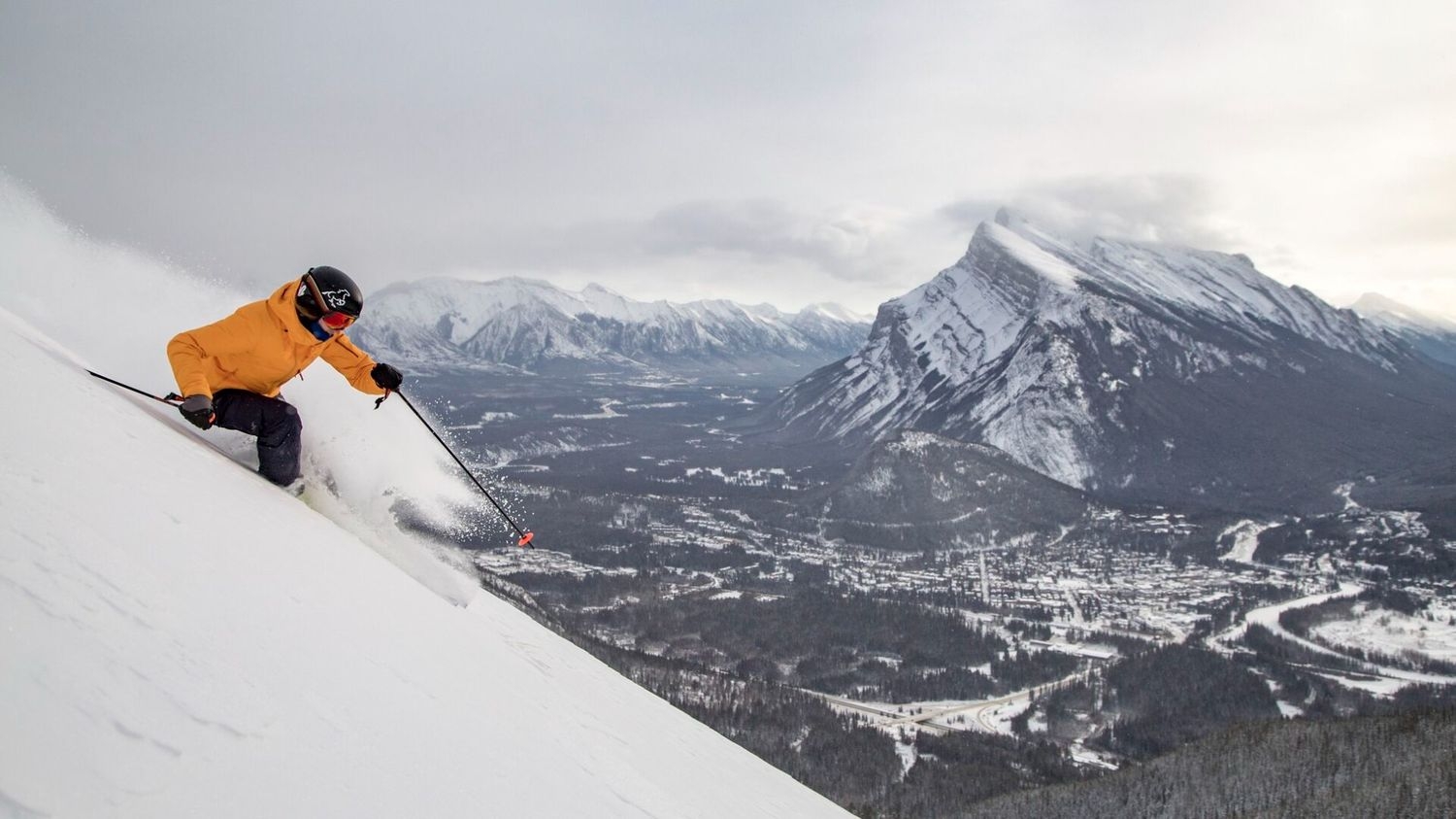 Mt Norquay – Banff in Canada - a person skiing down the side of a mountain.