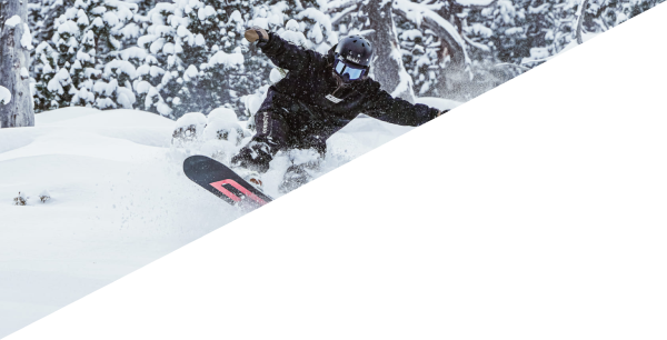 A snowboarder gliding down the snowy slopes of Pal Arinsal – La Massana in La Massana, Andorra, enjoying the adrenaline rush and the frosty mountain air.