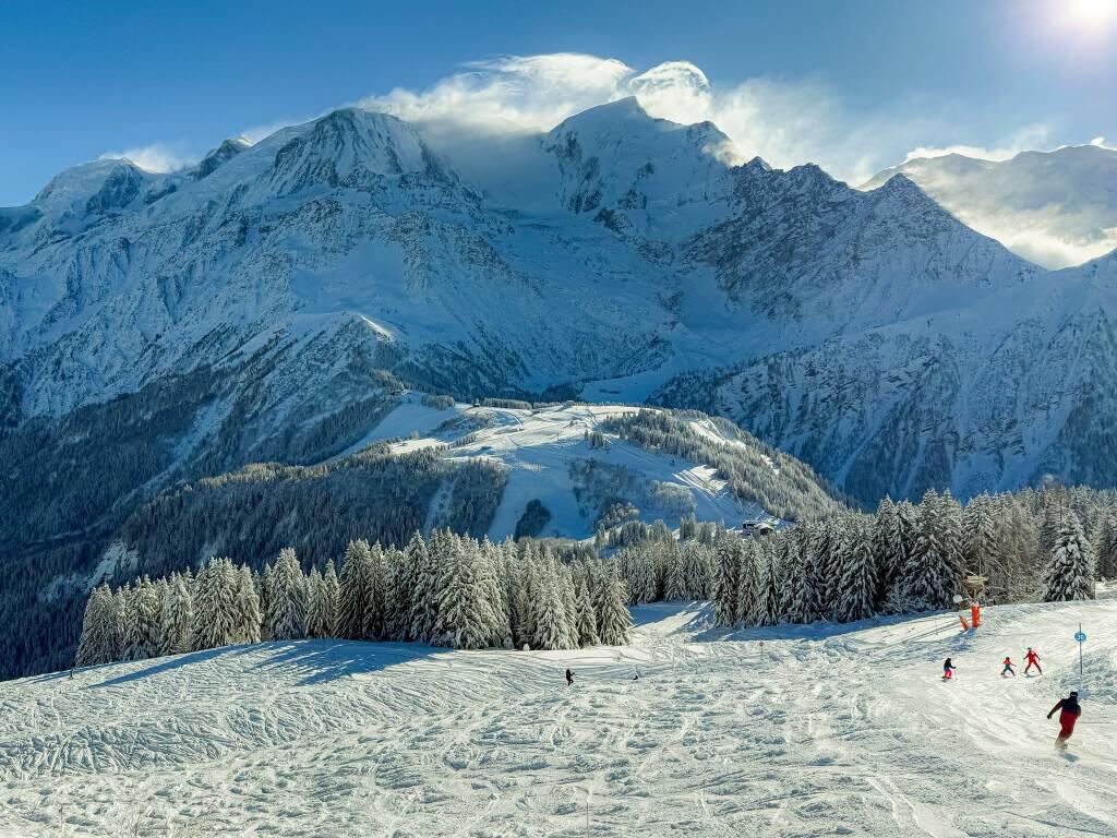 Les Houches Saint-Gervais in France - people skiing on the slopes of a mountain.