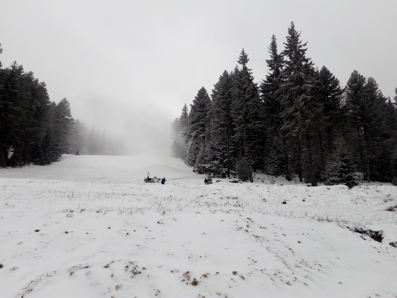 Ossogovo in Bulgaria - a person riding a snowmobile in the snow.