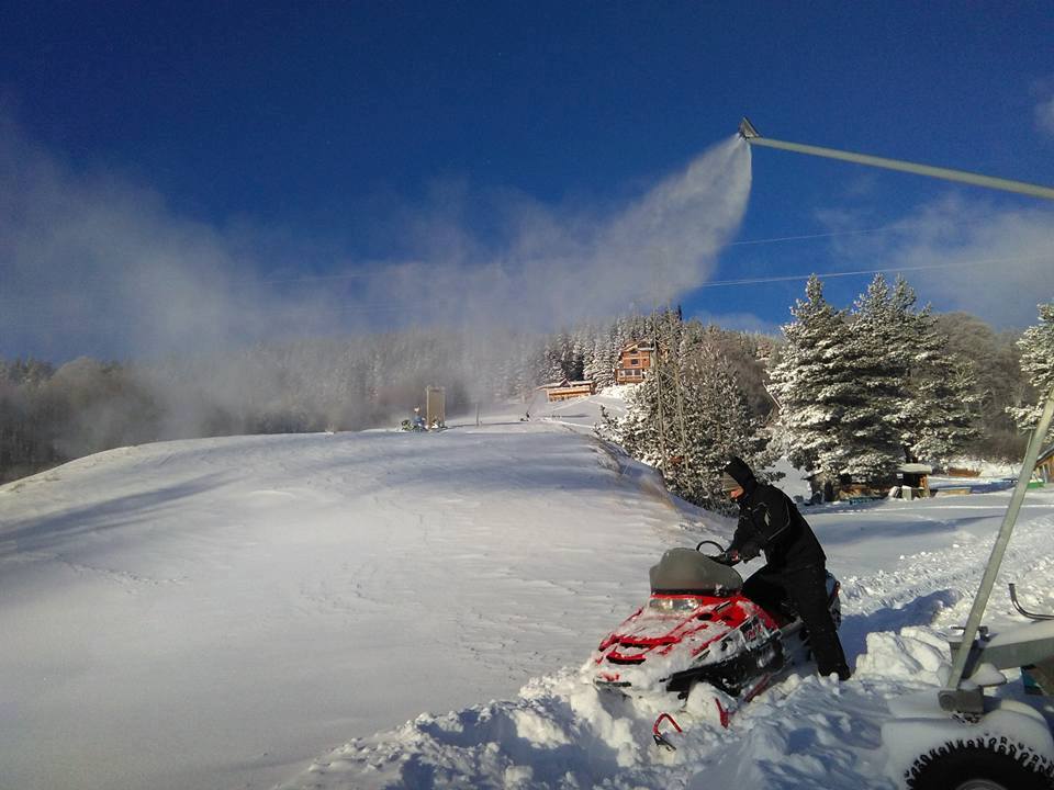 Ossogovo in Bulgaria - a person on a snowmobile in the snow.