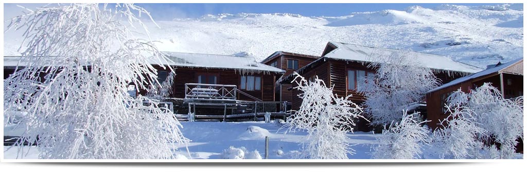 Winter sports centre, challet, and lodge at Tiffindell ski resort in Barkly East, Eastern Cape, South Africa showing a picturesque winter sports scene.
