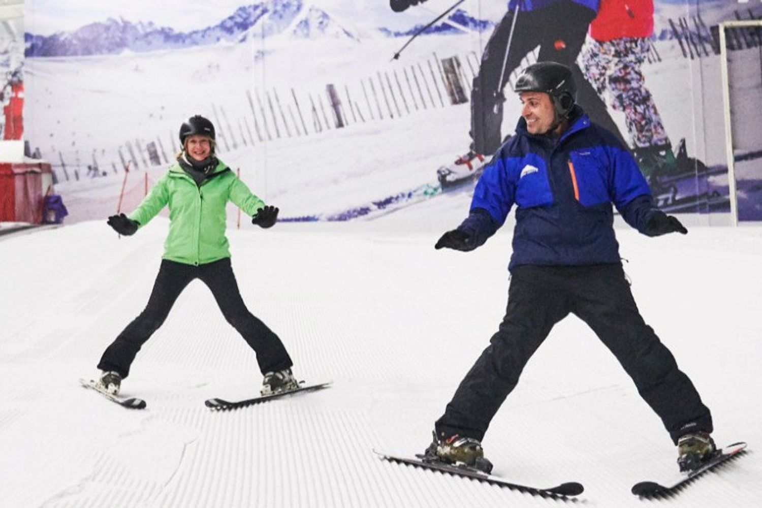 Midlothian Ski Centre in United Kingdom - two children are skiing on a snowy slope.