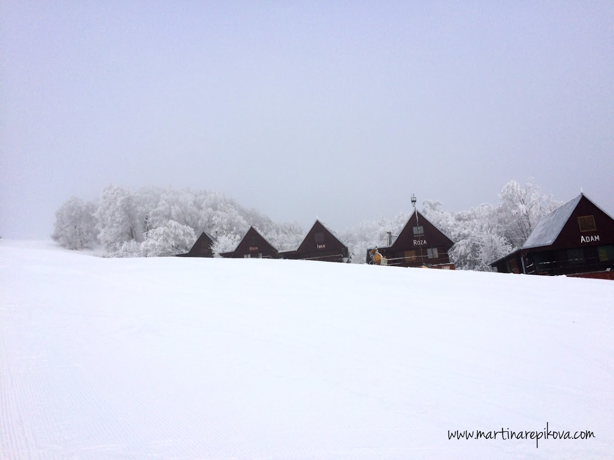Bezovec in Slovakia - a row of wooden houses in the snow.