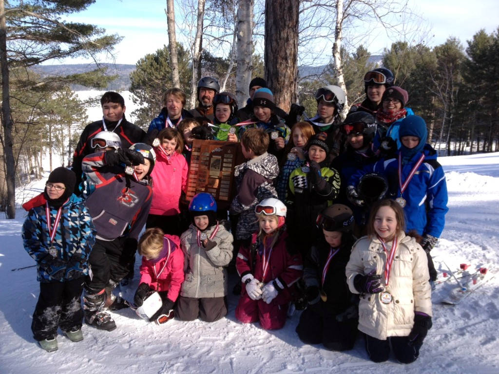 Mount Martin – Deep River in Canada - a group of people posing for a picture in the snow.