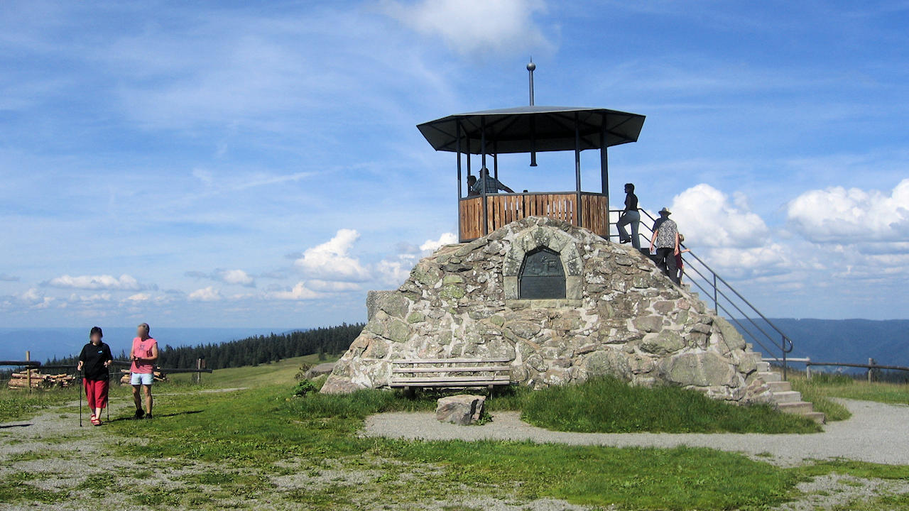 Kandel in Germany - a couple of people standing on top of a mountain.