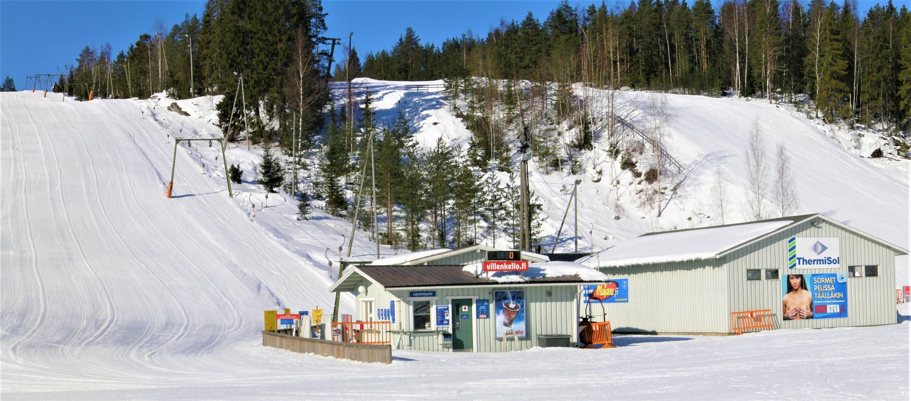 Ellivuori in Finland: a ski slope with a small building in the middle.