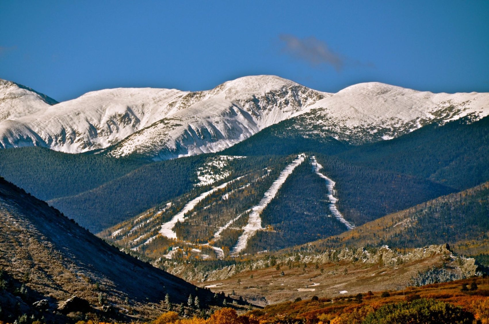 Cuchara Mountain Park in USA - the mountains are covered in snow and trees.