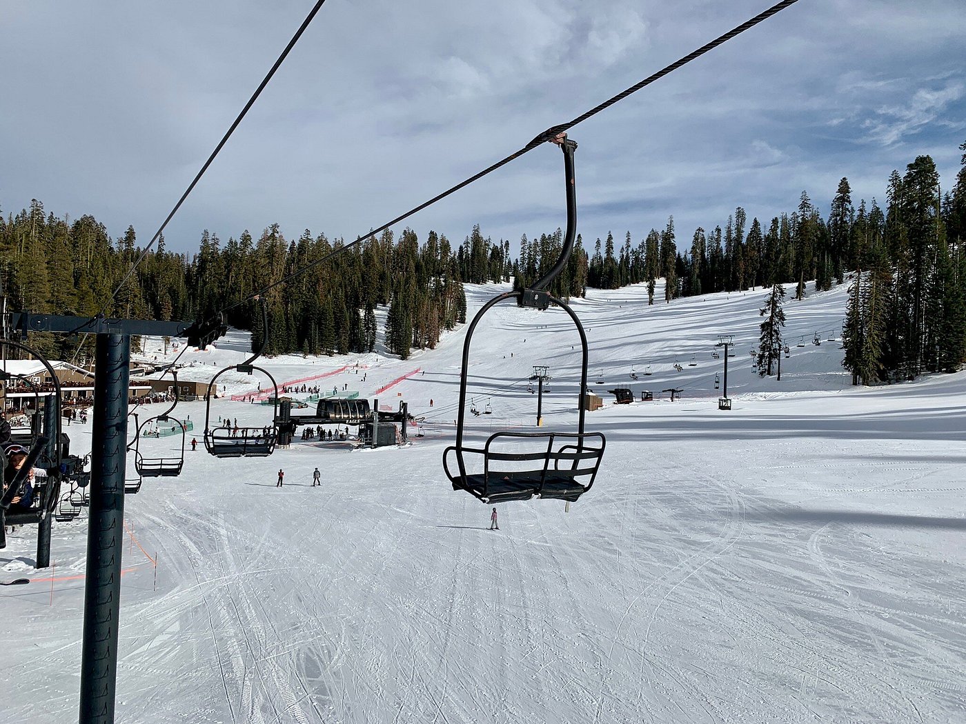 A scene from Badger Mountain Washington State USA showcasing a ski lift dominating the snowy landscape indicating a ski resort with evidence of winter sports activities.