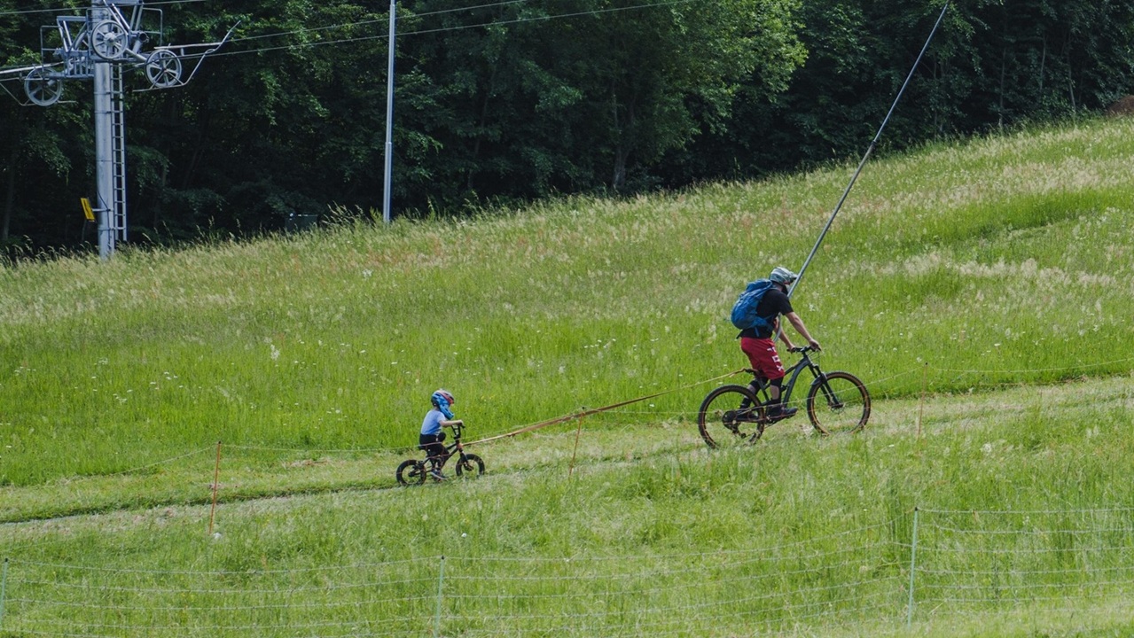 Drozdovo – Nová Baňa in Slovakia - a person riding a bike down a hill.