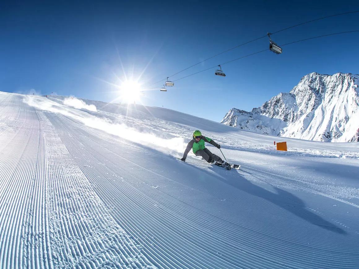 Skizentrum St. Jakob in Austria - a person skiing down the side of a mountain.