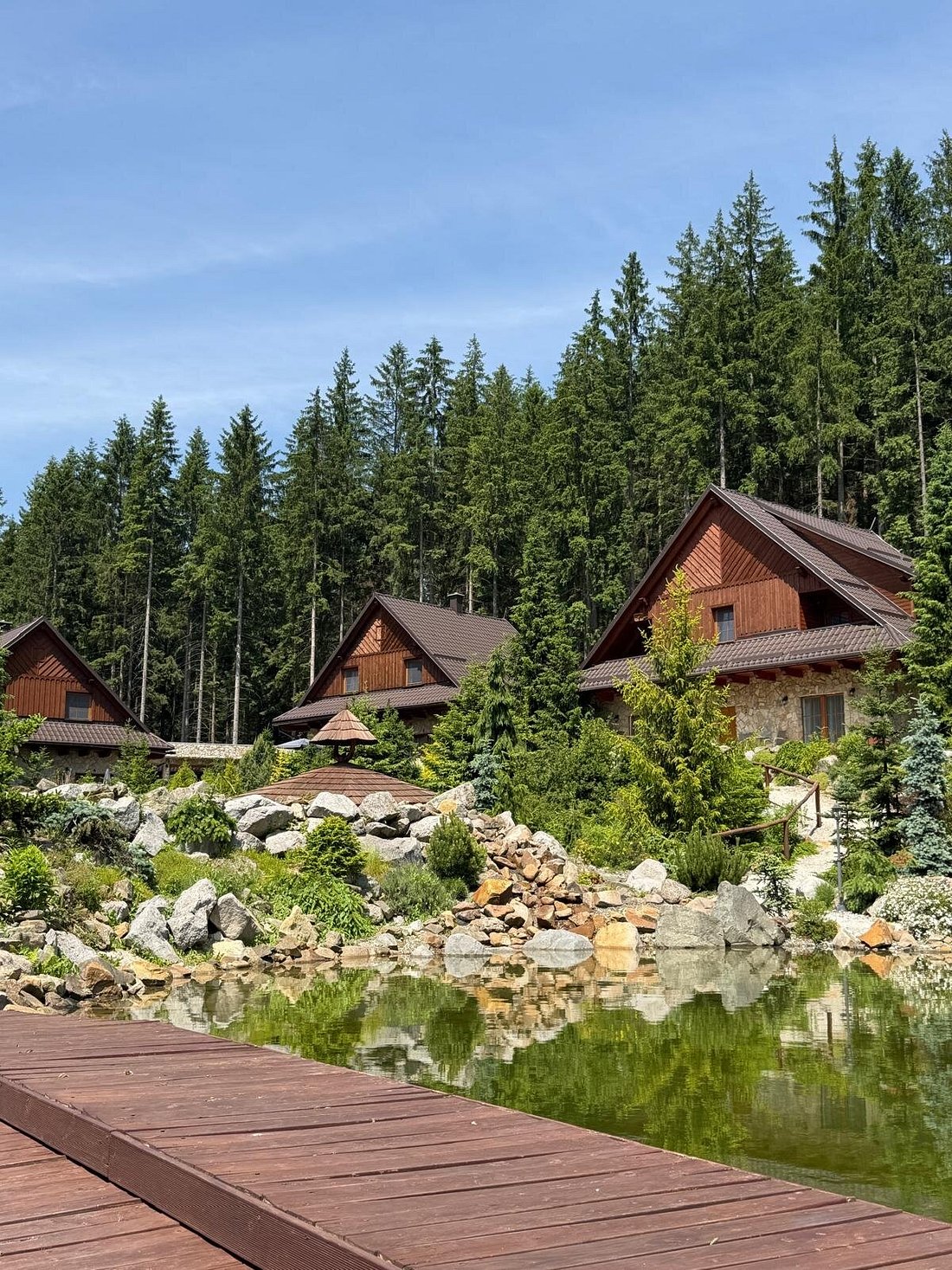 Mezivodí in Czech Republic - a wooden dock sitting on top of a lake.