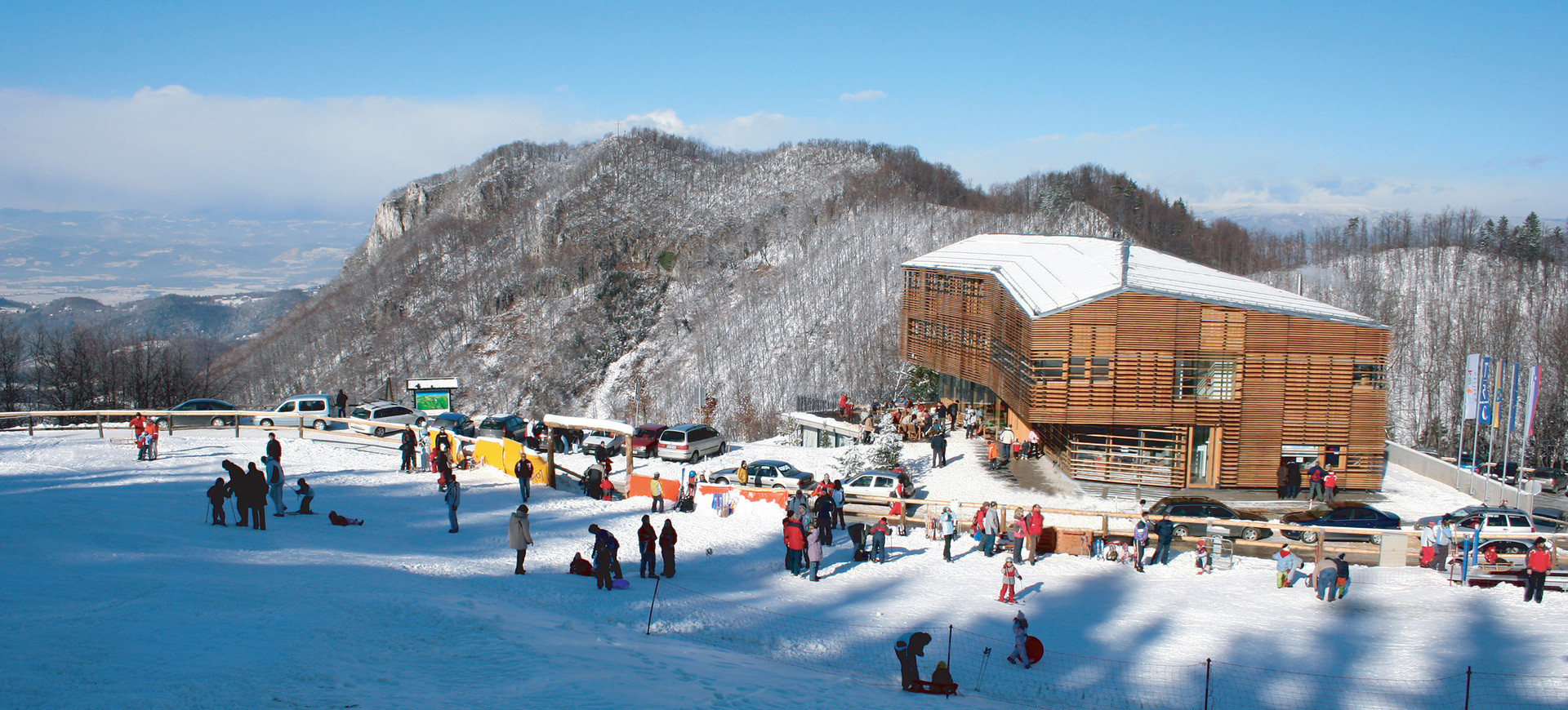 Celjska koča in Slovenia - a group of people standing in the snow.