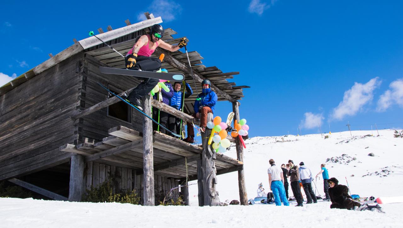 Mustavaara in Finland: a group of people standing on top of a snow covered building.
