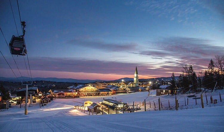 Stratton Mountain Resort in USA - a ski slope with a ski lift in the background.
