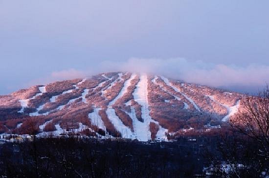 Stratton Mountain Resort in USA - a mountain covered in snow.