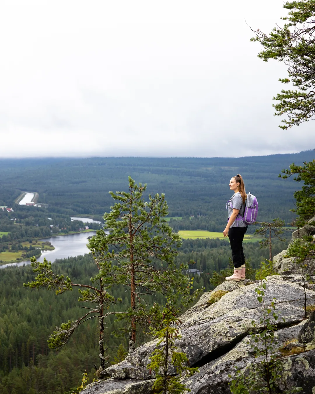 Aavasaksa in Finland - a woman standing on top of a mountain.